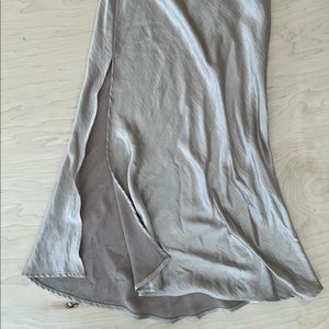 Mid length skirt with slit